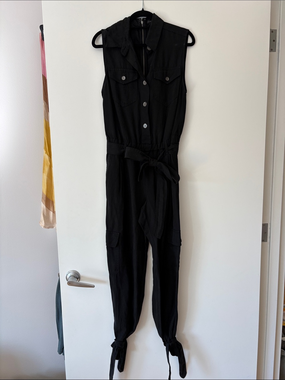 Alice + Olivia Black Sleeveless Utility Jumpsuit with Tie Waist and Ankle Ties